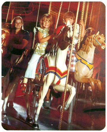 (Image: Riders Enjoy the Carousel)