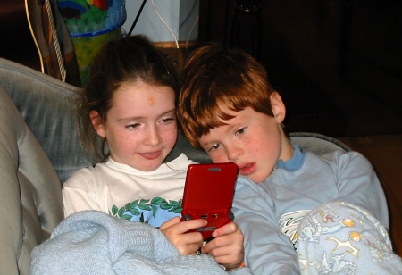 Emily and James playing GameBoy