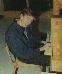 Me relaxing at my computer in my old high school
